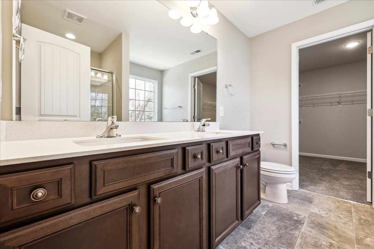 https://assets.windsorhomes.us/img/BCR_lot4_Stoddard_elvF_1949_Kippen_Drive_primary_bath.jpg