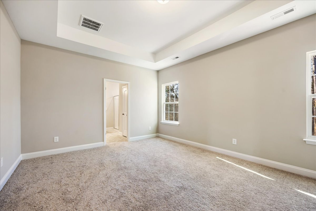 https://assets.windsorhomes.us/img/Bailey_A_SWS_lot2_5189-Salem-Church-Rd_primary_bedroom_2.jpg