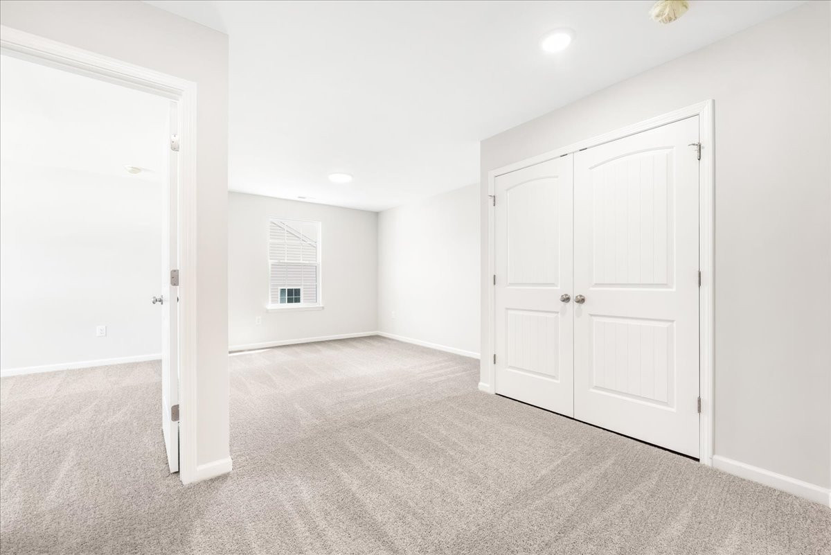 https://assets.windsorhomes.us/img/CCK_lot18_Stoddard_elvE_4099_Stalion_Street_bonus.jpg