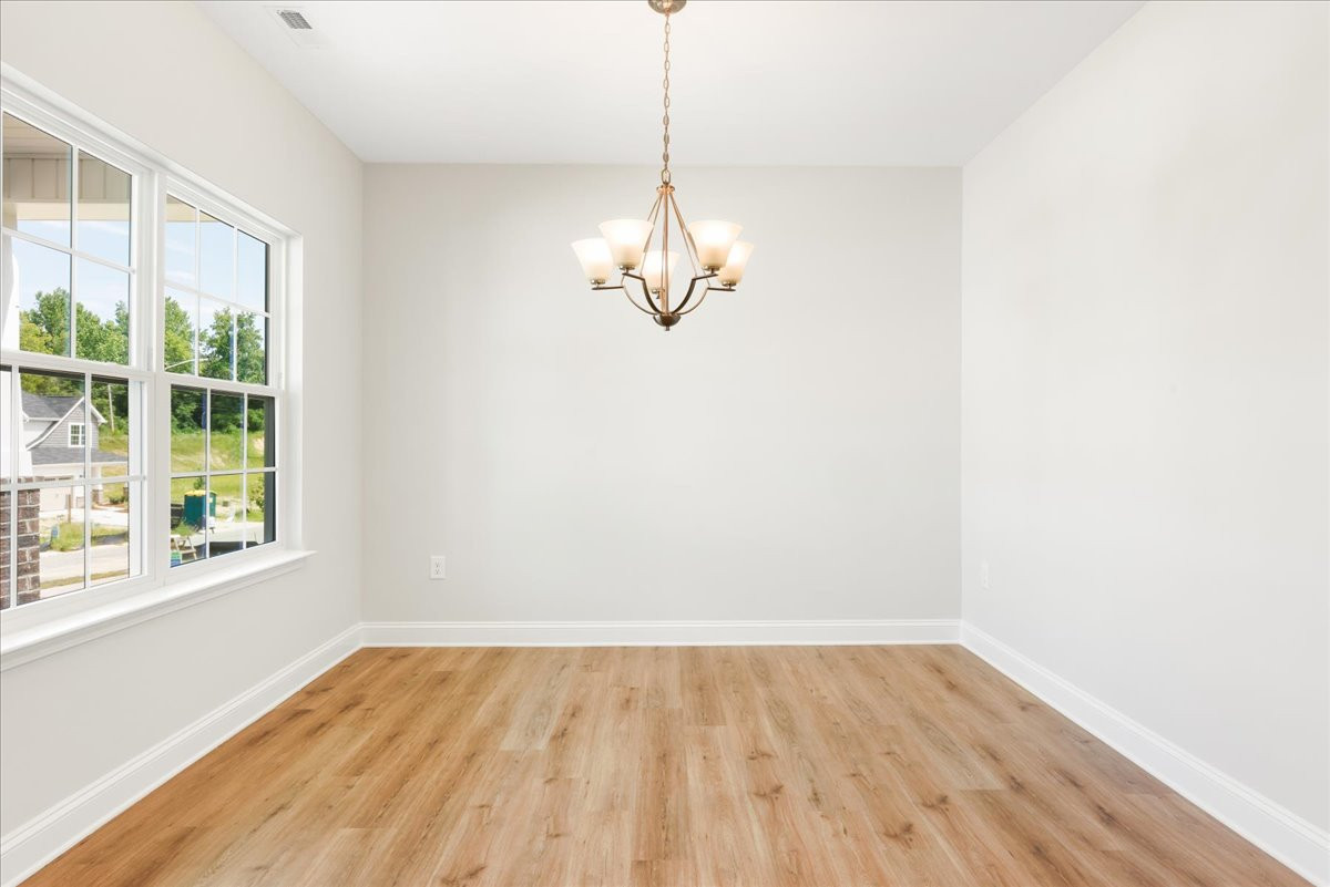 https://assets.windsorhomes.us/img/CCK_lot18_Stoddard_elvE_4099_Stalion_Street_dining.jpg