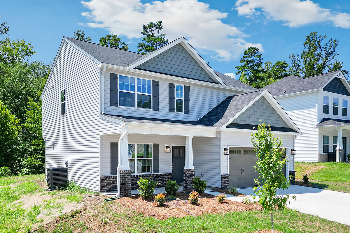 https://assets.windsorhomes.us/img/CCK_lot18_Stoddard_elvE_4099_Stalion_Street_exterior_front_side.jpg