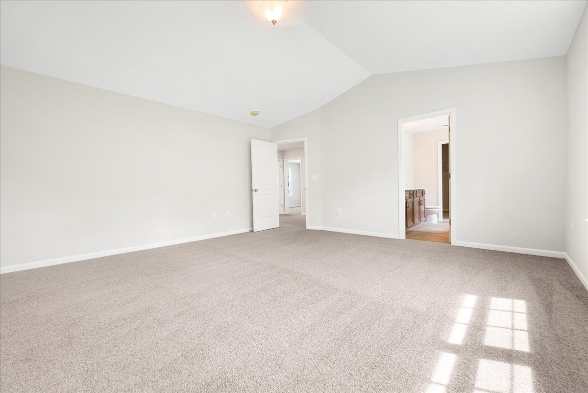 https://assets.windsorhomes.us/img/CCK_lot18_Stoddard_elvE_4099_Stalion_Street_primary_bedroom_2.jpg