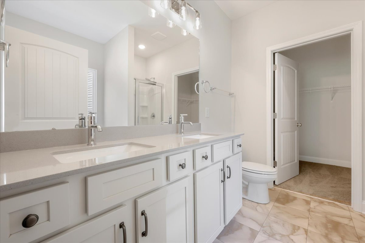 https://assets.windsorhomes.us/img/CCK_lot78_Somerset_elvD_4106_Stallion_Street_primary_bath_edit.jpg
