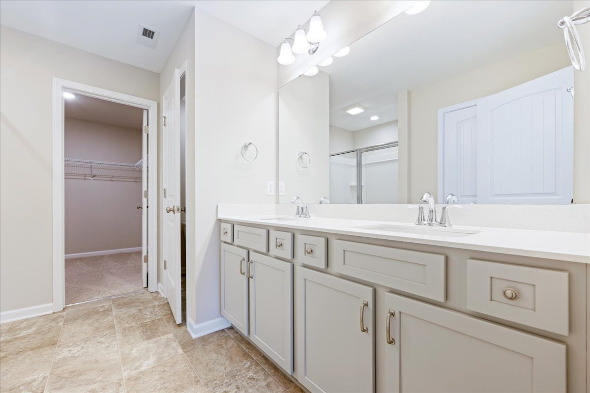 https://assets.windsorhomes.us/img/CCK_lot80_Seagrove_elvD_4114_Stallion_street_primary_bath.jpg