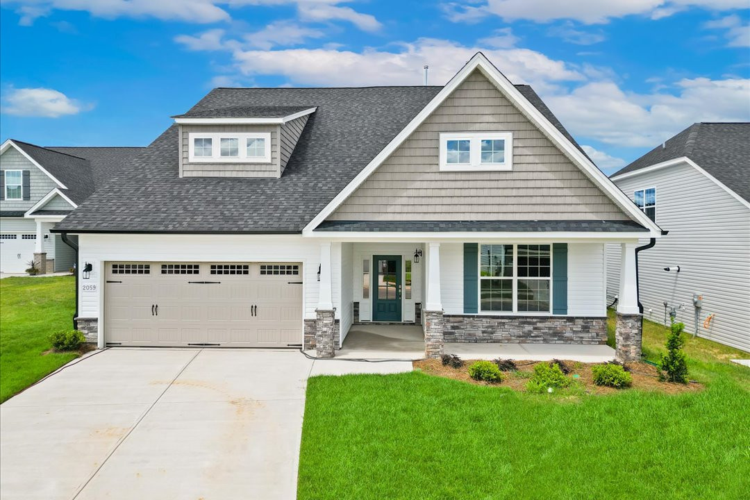 https://assets.windsorhomes.us/img/Cotswold_3_BD_lot42_2059_Dowell_Court_Exterior_Front.jpg