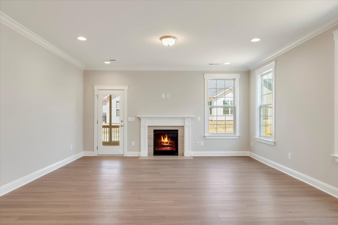 https://assets.windsorhomes.us/img/Cotswold_3_G_BD_lot39_2097_Dowell_Court_Great_Room.jpg