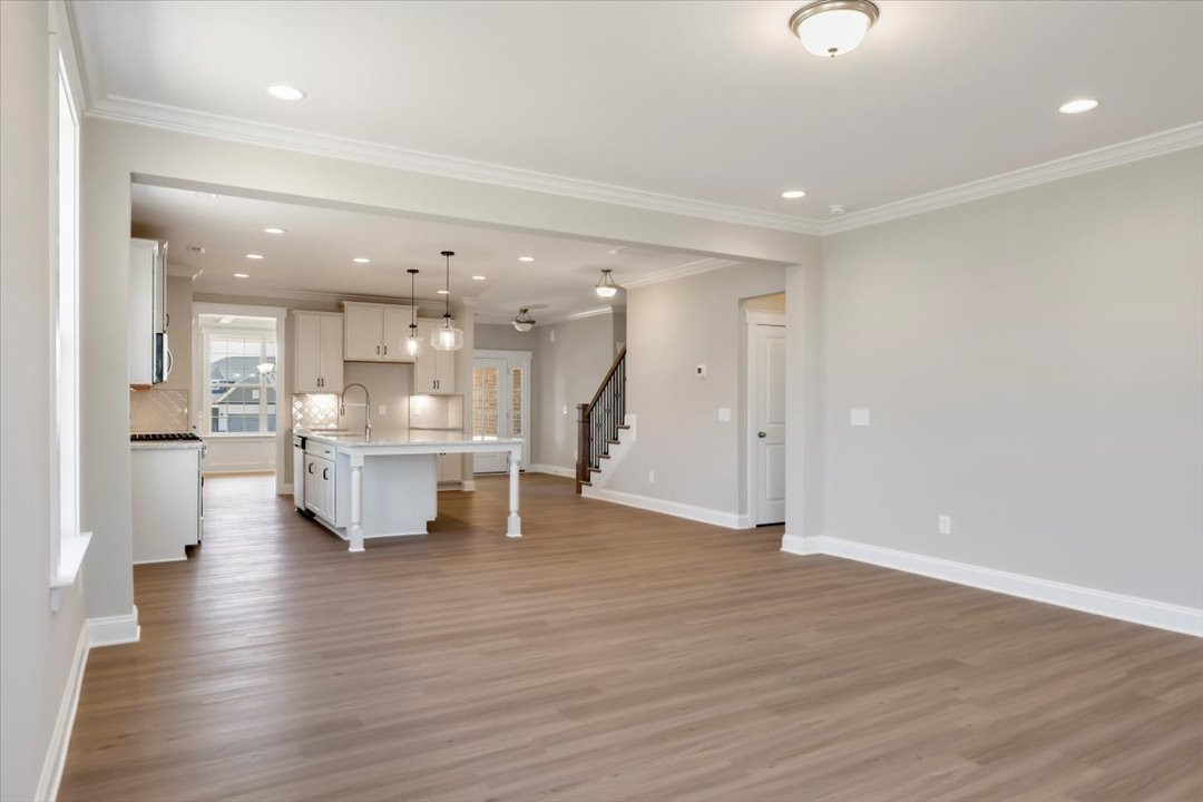 https://assets.windsorhomes.us/img/Cotswold_3_G_BD_lot39_2097_Dowell_Court_Great_Room_2.jpg