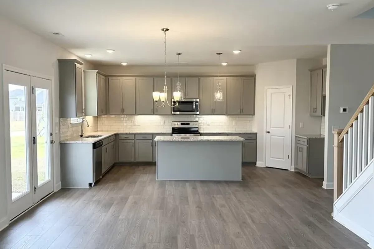 https://assets.windsorhomes.us/img/GRY_lot150_Cameron_B_7841_Waterwillow_Dr_kitchen.webp