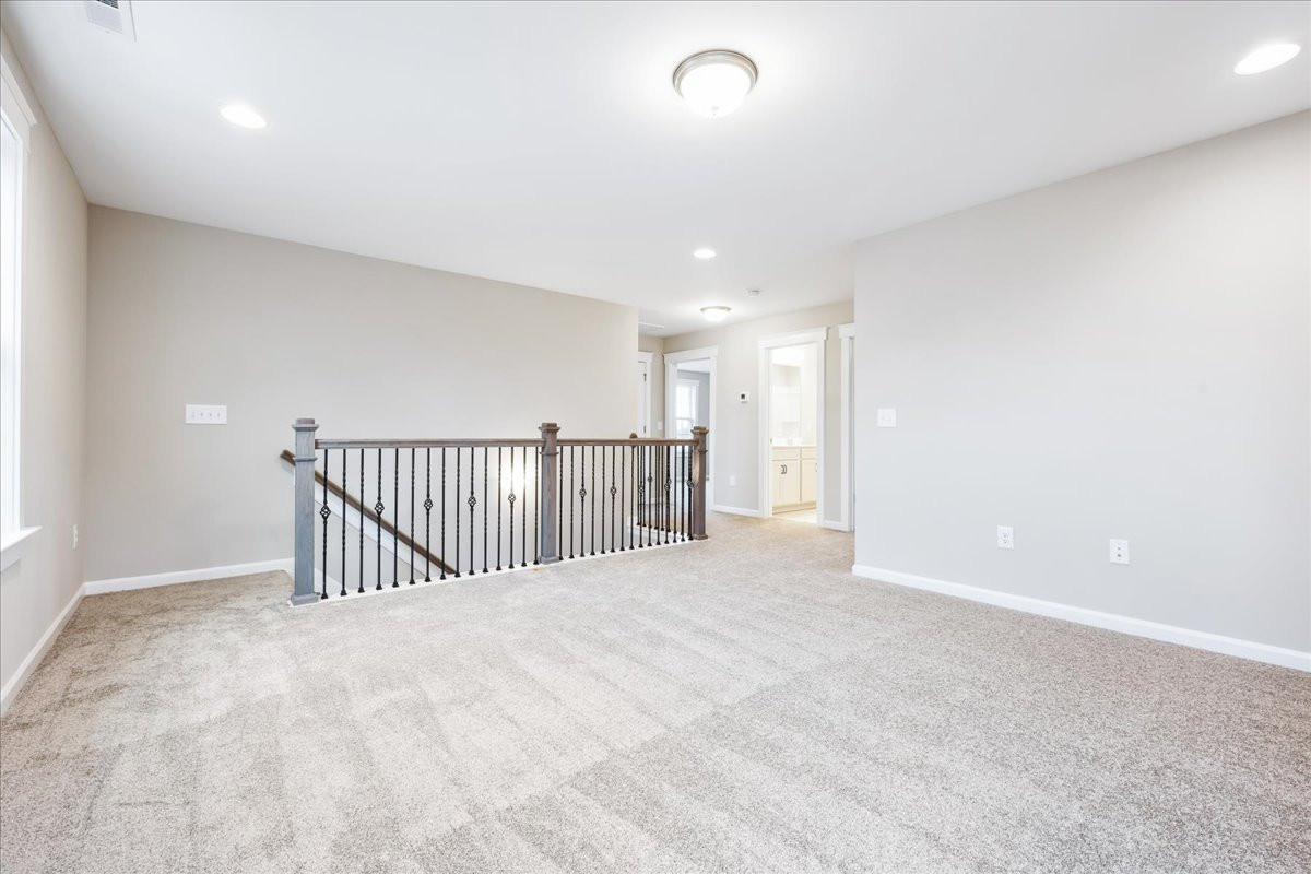 https://assets.windsorhomes.us/img/KL_Lot92_Bailey_elvA_1410_Reading_Ct_loft.jpg