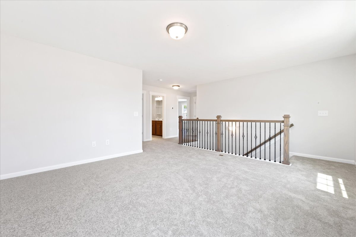 https://assets.windsorhomes.us/img/KL_lot75_Bailey_elvB_1403_Reading_Ct_loft.jpg