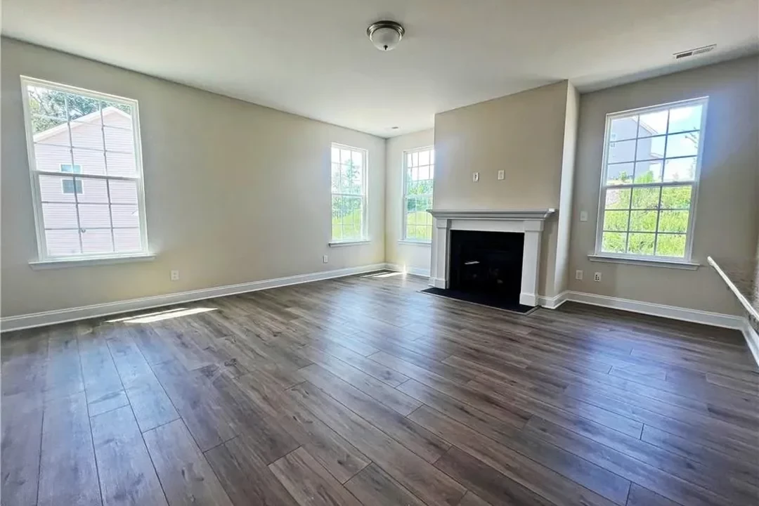 https://assets.windsorhomes.us/img/Lewisville_F_LS_lot201_216_Mimosa_Drive_Great_Room_2.webp