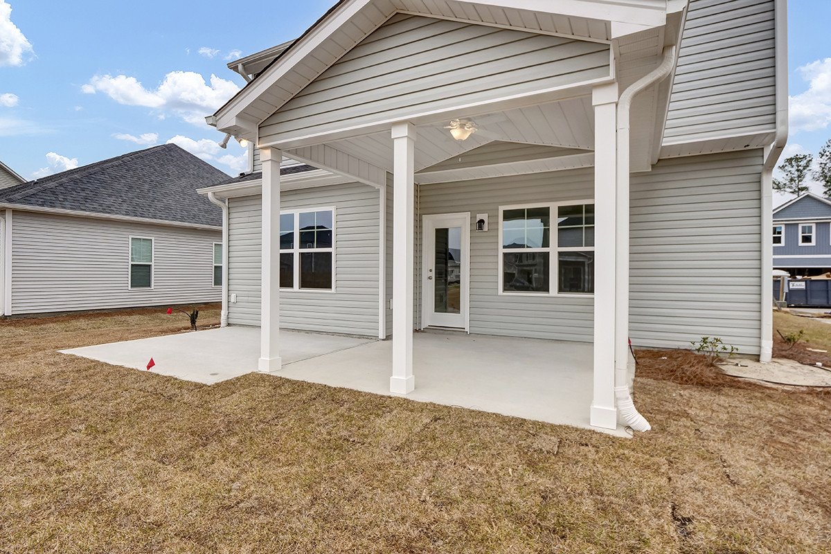 https://assets.windsorhomes.us/img/MBW_lot59_Southport_809_Red_Sky_Drive_exterior_rear.JPG
