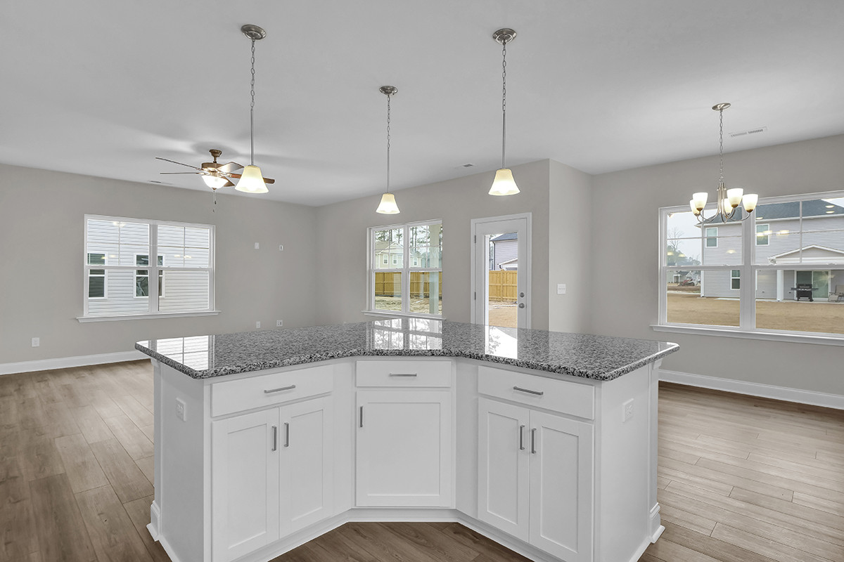 https://assets.windsorhomes.us/img/MBW_lot59_Southport_809_Red_Sky_Drive_kitchen_4.JPG