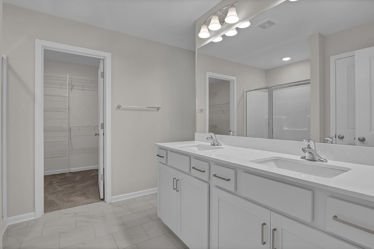 https://assets.windsorhomes.us/img/MBW_lot59_Southport_809_Red_Sky_Drive_primary_bath.JPG