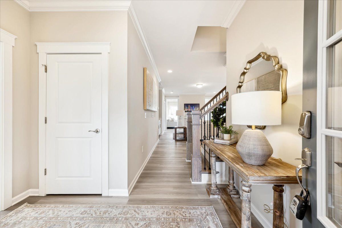 https://assets.windsorhomes.us/img/MG_Lot102_Pinehurst_C_1036_Fairhaven_Dr_foyer.jpg