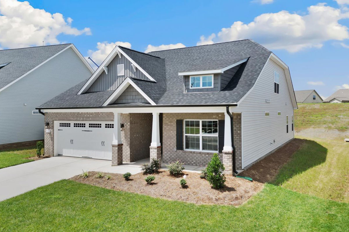 https://assets.windsorhomes.us/img/MG_lot97_Pinehurst_elvB_1056_Fairhaven_Drive_exterior_front_Side.jpg