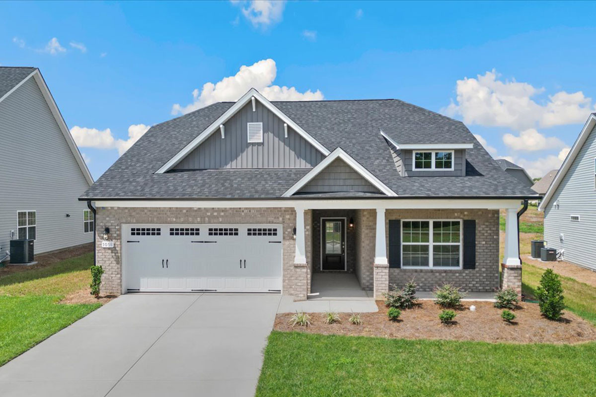 https://assets.windsorhomes.us/img/MG_lot97_Pinehurst_elvB_1056_Fairhaven_Drive_exterior_full_front.jpg