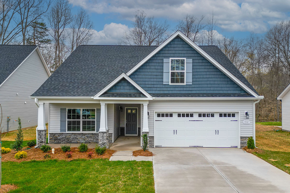 https://assets.windsorhomes.us/img/MVG_lot12_Pinehurst_elvC_1987_Meadowview_Dr_exterior_full_front_crop.jpg