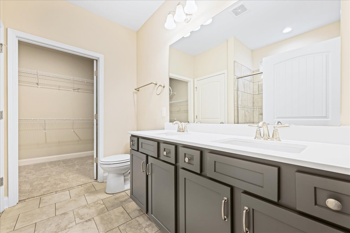 https://assets.windsorhomes.us/img/MVG_lot13_Somerset_elvC_1985_Meadowvie_Dr_primary_bath.jpg