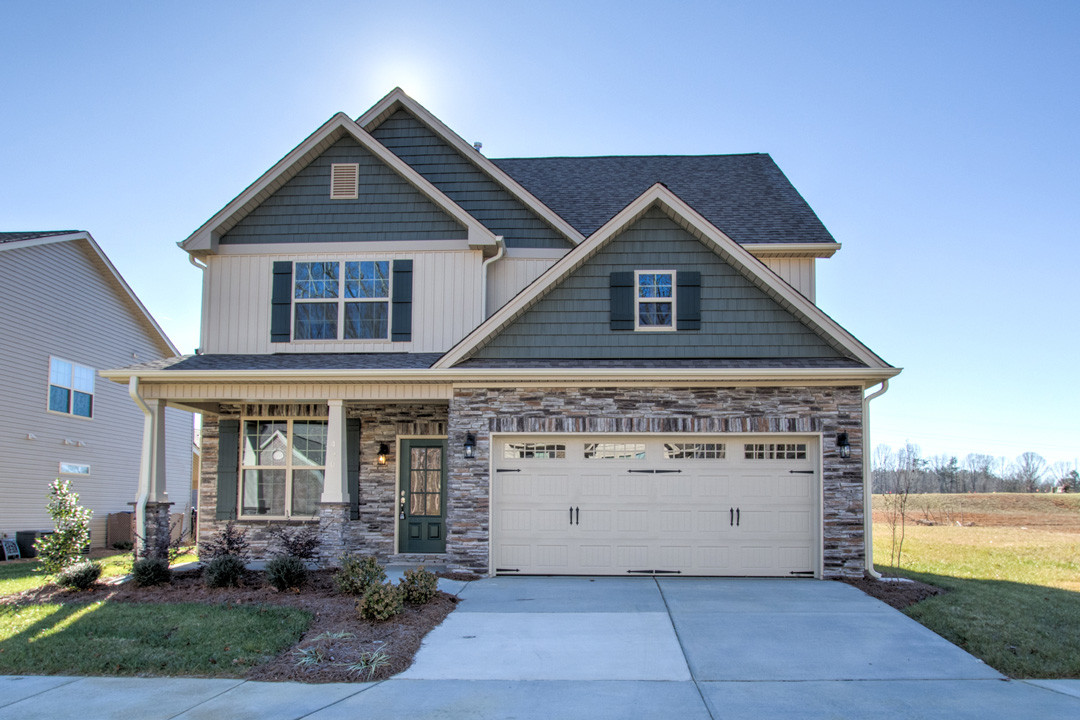 https://assets.windsorhomes.us/img/Montgomery_B_CSS_lot65_490-Olsen-Drive_exterior-front.jpg
