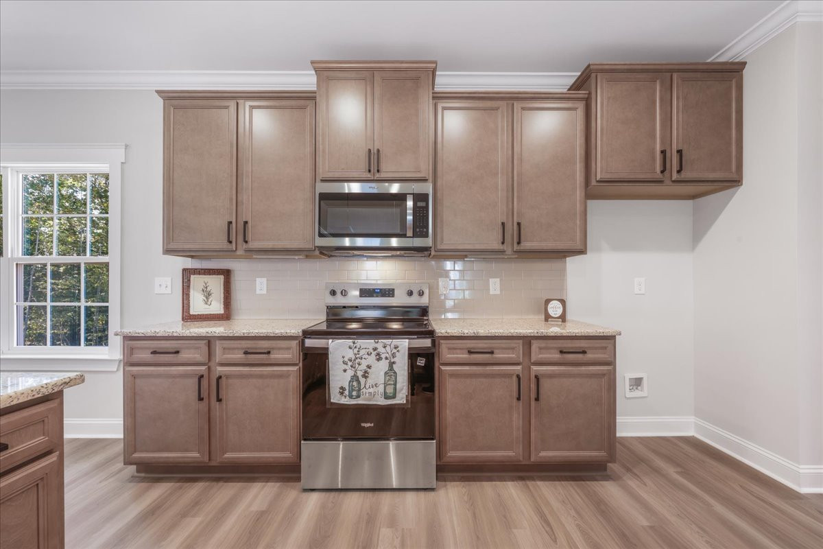 https://assets.windsorhomes.us/img/RFM_lot41_Bailey_elvE_413_Stonewell_Court_kitchen_4.jpg