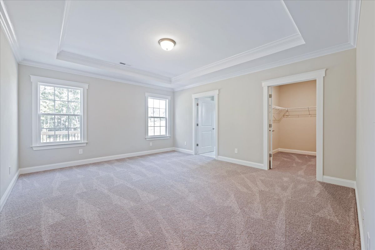 https://assets.windsorhomes.us/img/RFM_lot45_Cotswold_elvG_406_Stonewell_Court_primary_bedroom.jpg