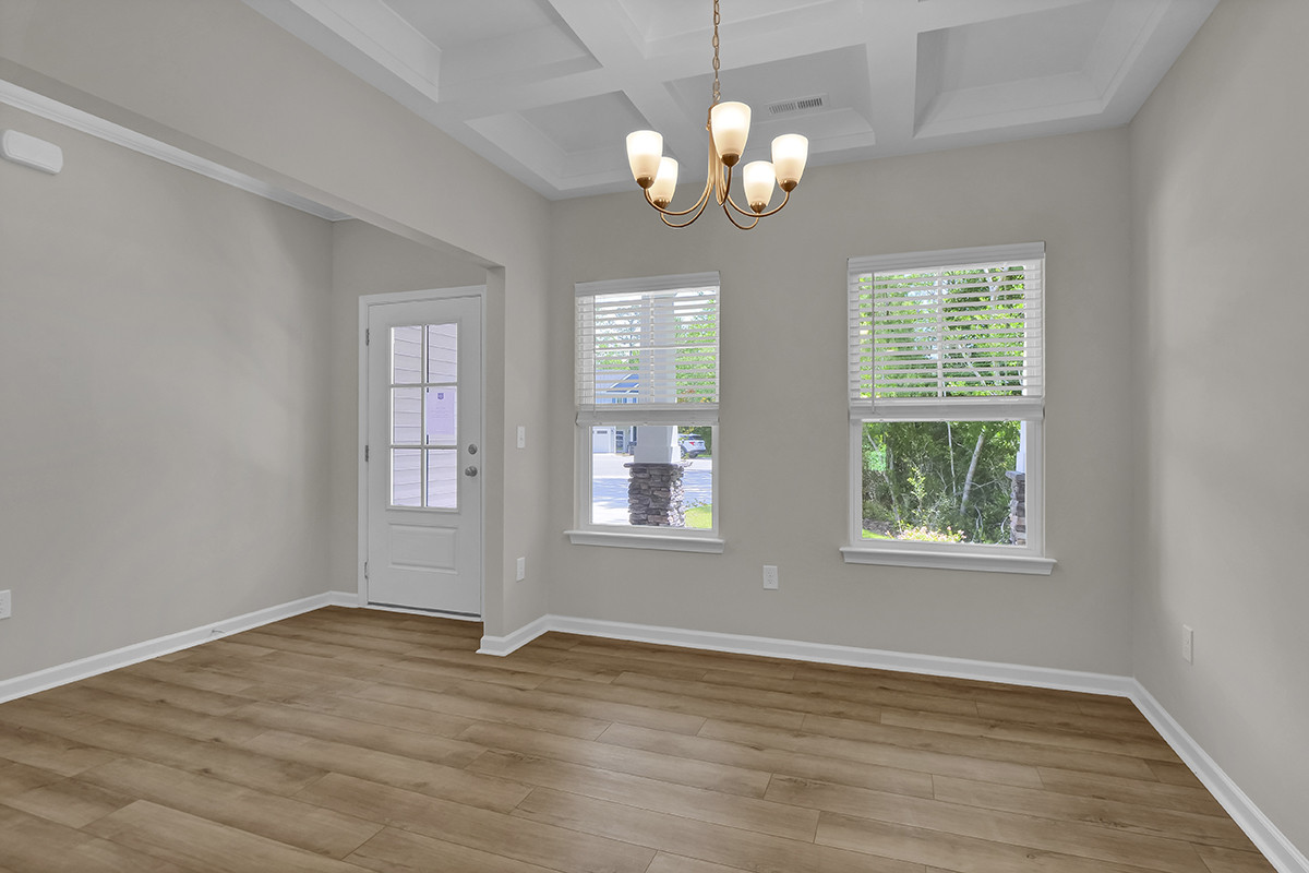 https://assets.windsorhomes.us/img/RR_lot23_Bailey_elvE_789_Compass_Rose_Lane_SW_dining.JPG