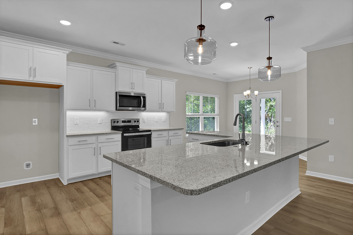 https://assets.windsorhomes.us/img/RR_lot23_Bailey_elvE_789_Compass_Rose_Lane_SW_kitchen.JPG