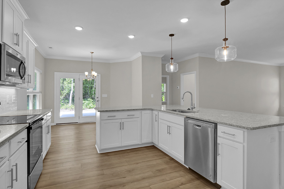 https://assets.windsorhomes.us/img/RR_lot23_Bailey_elvE_789_Compass_Rose_Lane_SW_kitchen_2.JPG