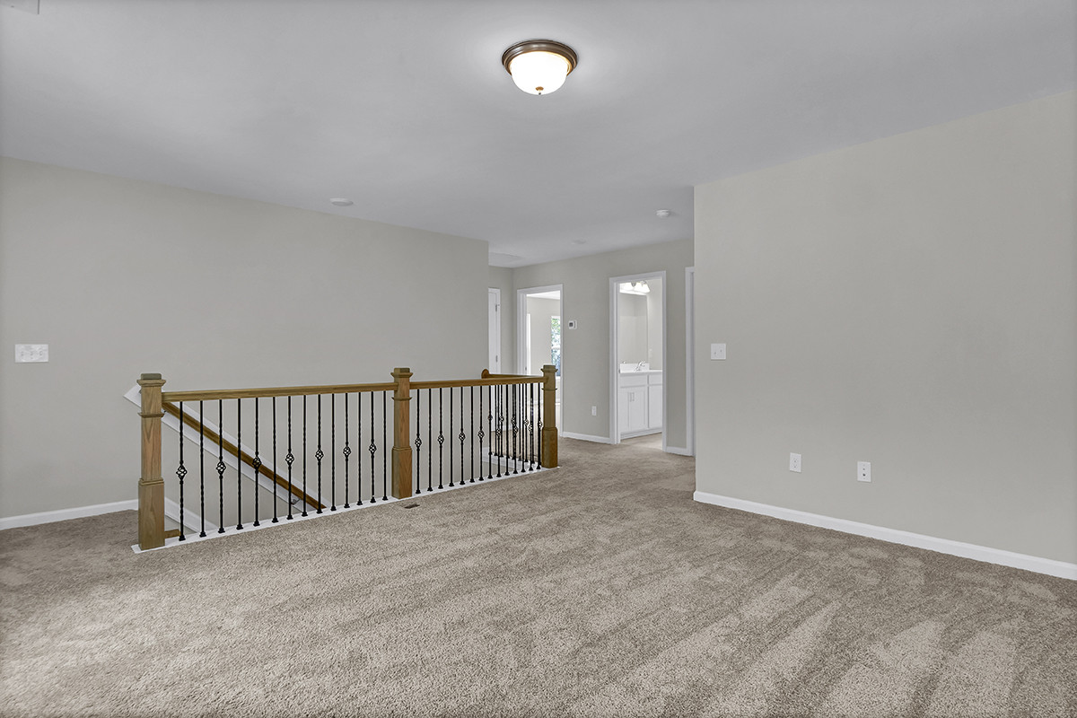 https://assets.windsorhomes.us/img/RR_lot23_Bailey_elvE_789_Compass_Rose_Lane_SW_loft.JPG