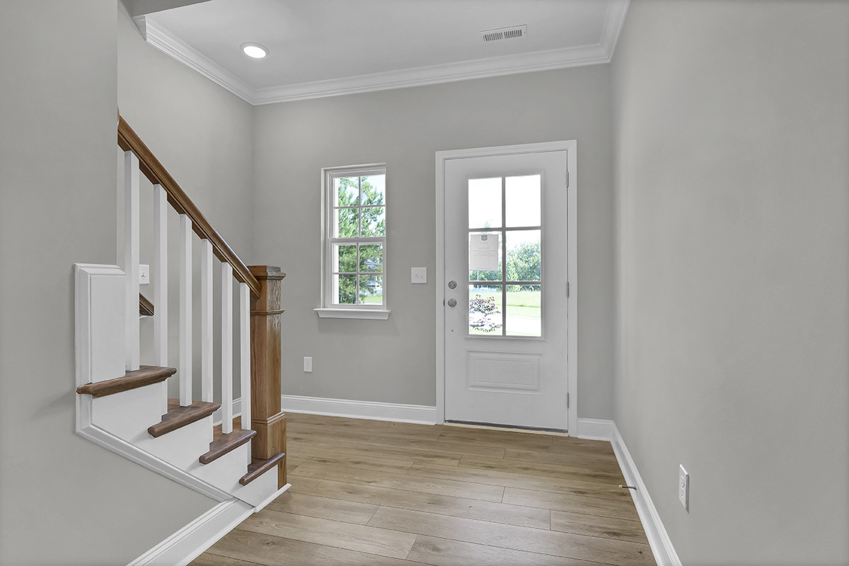 https://assets.windsorhomes.us/img/RR_lot61_Columbia_elvA_349_Eden_Drive_SW_foyer.JPG