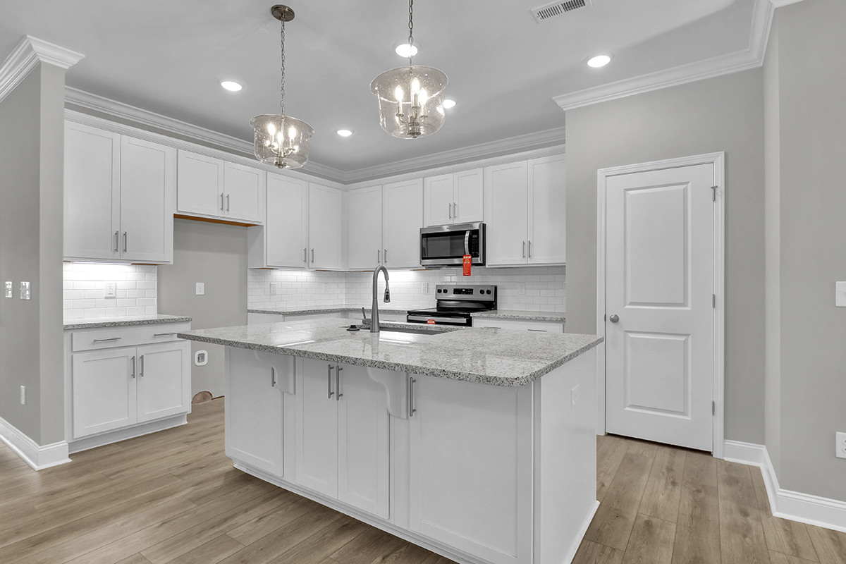 https://assets.windsorhomes.us/img/RR_lot61_Columbia_elvA_349_Eden_Drive_SW_kitchen_3.JPG