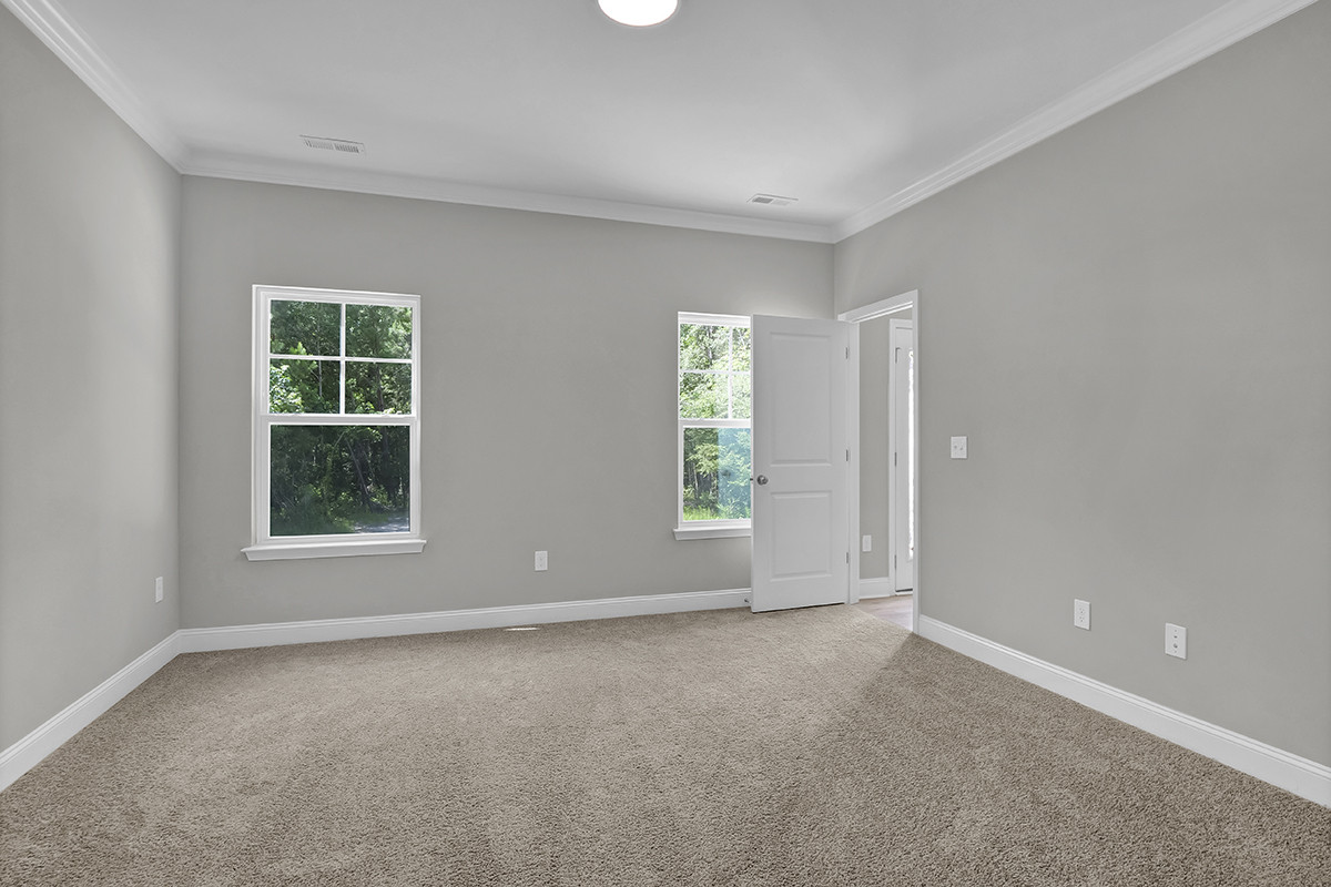 https://assets.windsorhomes.us/img/RR_lot61_Columbia_elvA_349_Eden_Drive_SW_primary_suite.JPG