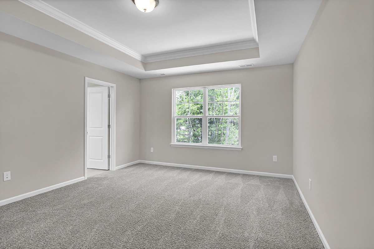 https://assets.windsorhomes.us/img/RR_lot78_Southport_elvB_888_Billys_Dream_Circle_SW_primary_suite.JPG