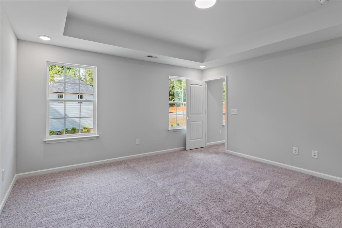 https://assets.windsorhomes.us/img/SWS_lot76_Cameron_elvB_5504_Jaeger_Drive_primary_bedroom_2.jpg