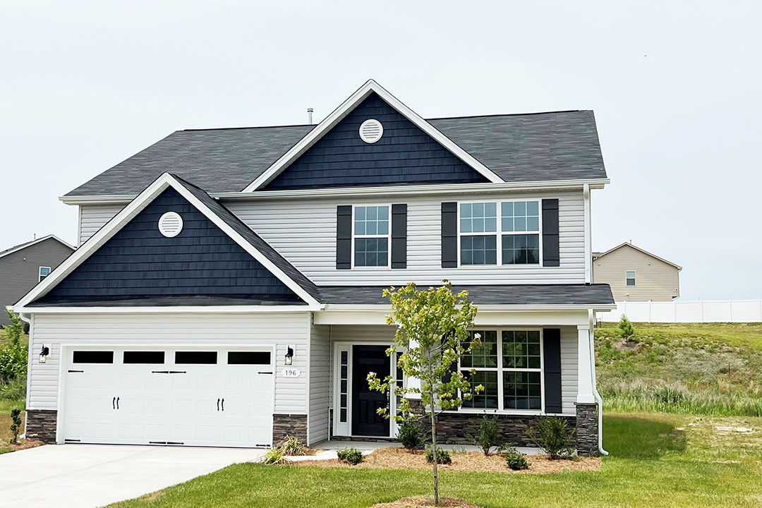 https://assets.windsorhomes.us/img/Seagrove_D_s3_ls_lot200_196_Mimosa_Drive_exterior_front.jpg