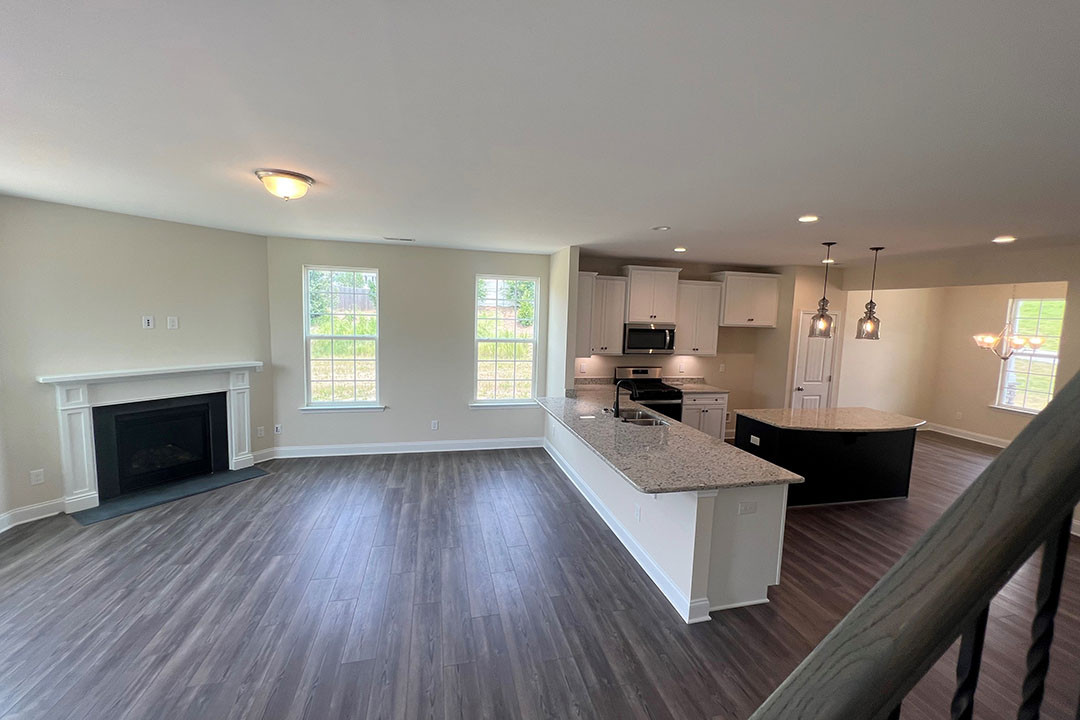 https://assets.windsorhomes.us/img/Seagrove_D_s3_ls_lot200_196_Mimosa_Drive_great_room.jpg