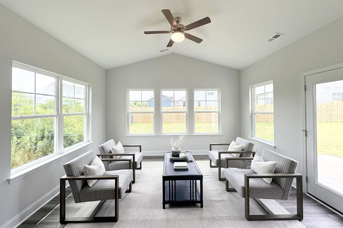 https://assets.windsorhomes.us/img/Somerset_C_GRY-2C_lot34_2669_Longleaf_Pine_Circle_sun_roomz.jpg