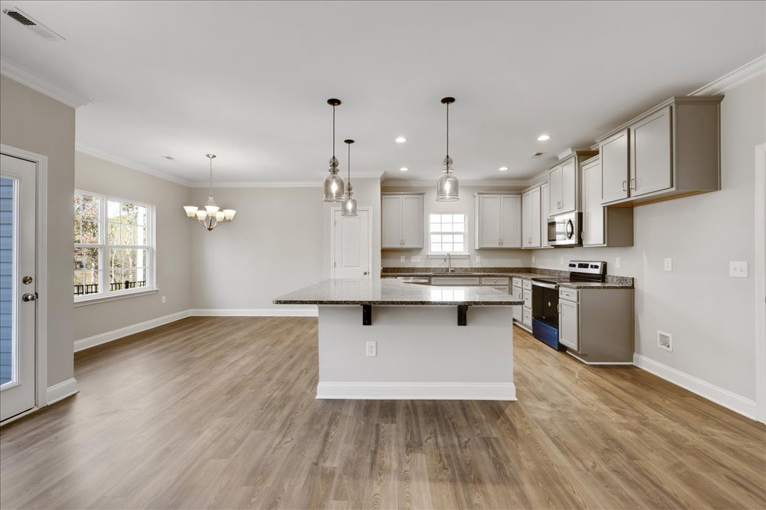 https://assets.windsorhomes.us/img/Southport_A_VR_lot42_1726_langlais_drive_Kitchen_view2.jpg