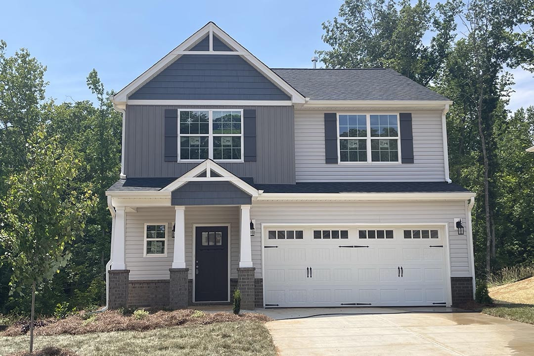 https://assets.windsorhomes.us/img/Southport_B_VR_lot40_1734_Langlais_Drive_Exterior_Front.jpg