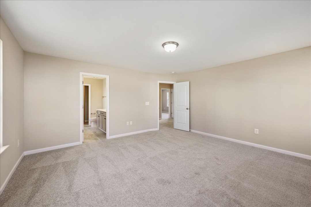 https://assets.windsorhomes.us/img/Stoddard_2_E_VR_lot59_1735_Langlais_drive_Primary_Bedroom_View2.jpg