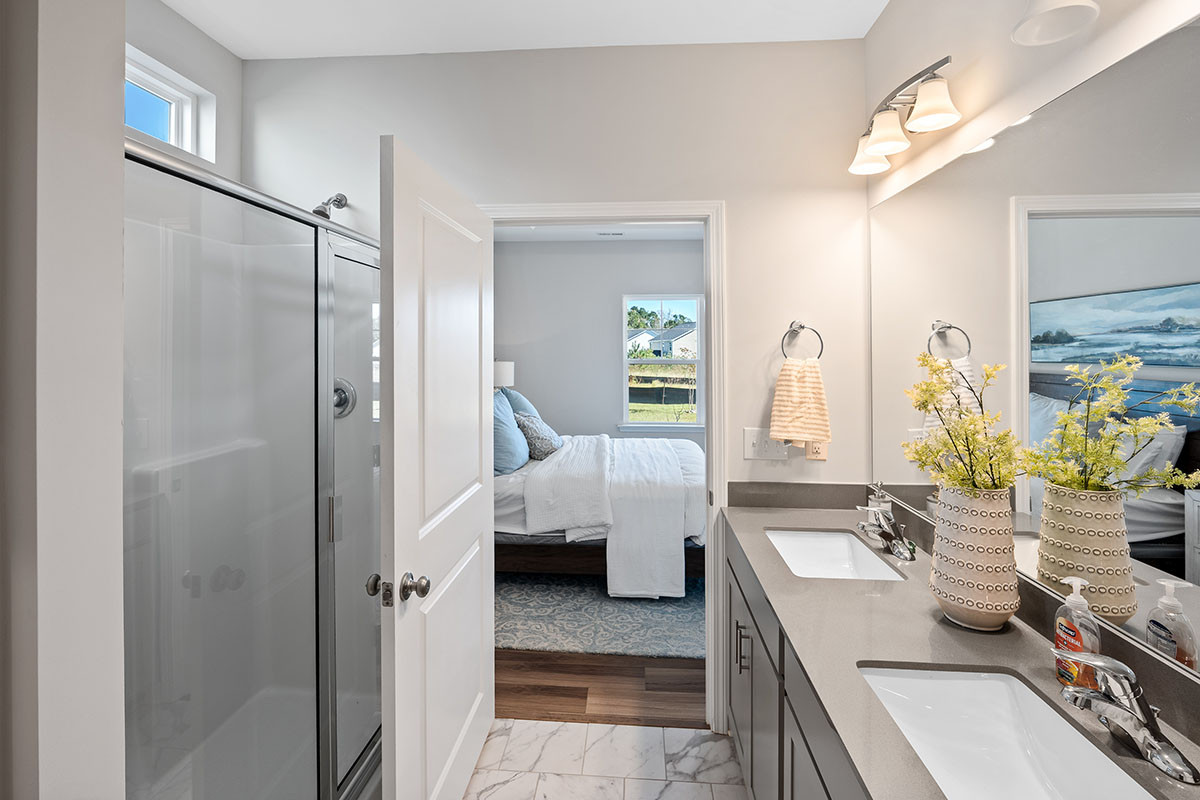 https://assets.windsorhomes.us/img/TT_lot19_Somerset_elvE_1018_Terraces_Ln_Primary_Bath.jpg