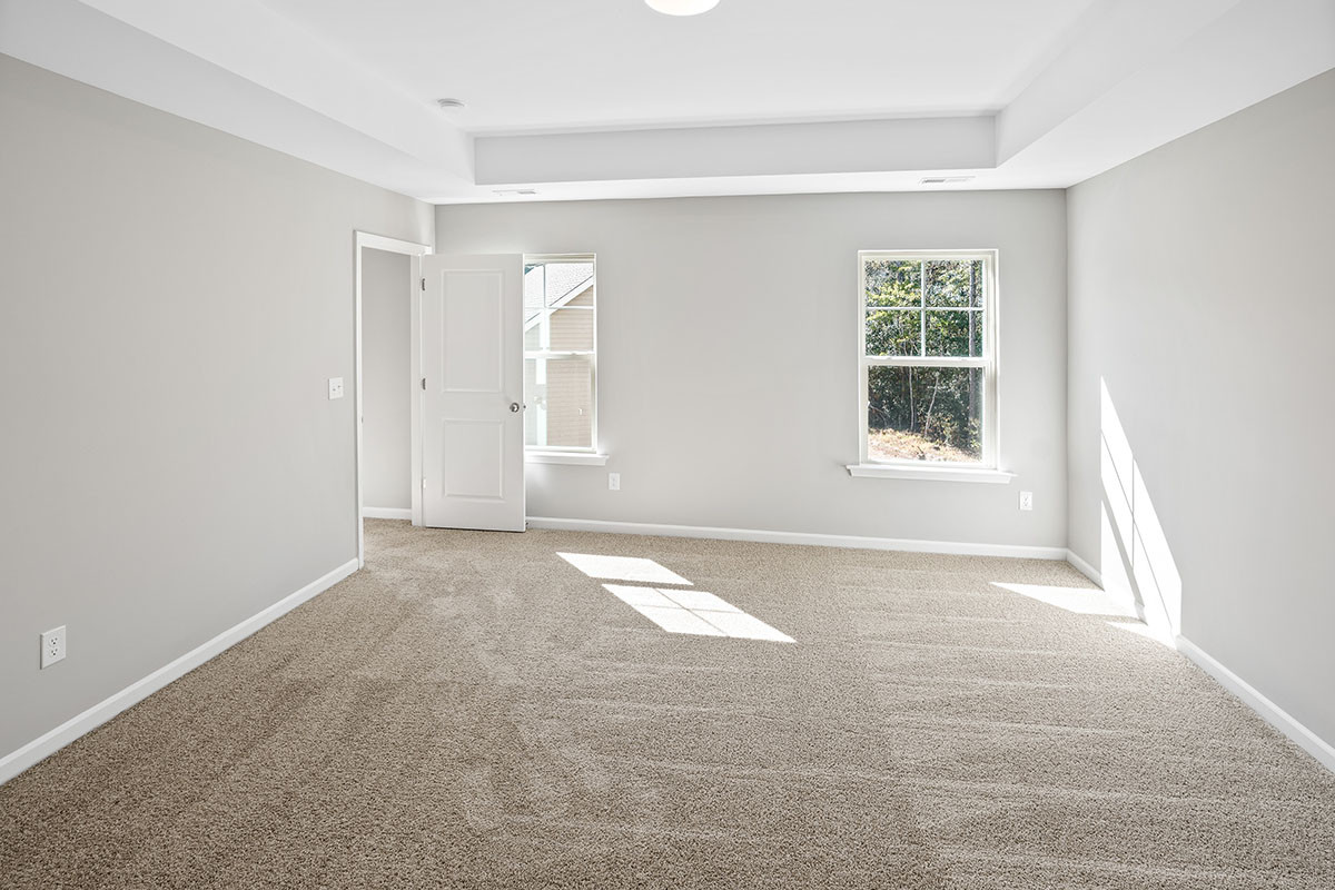 https://assets.windsorhomes.us/img/TT_lot74_Cameron_elvA_181_Portico_Ct_Primary_Bedroom.jpg