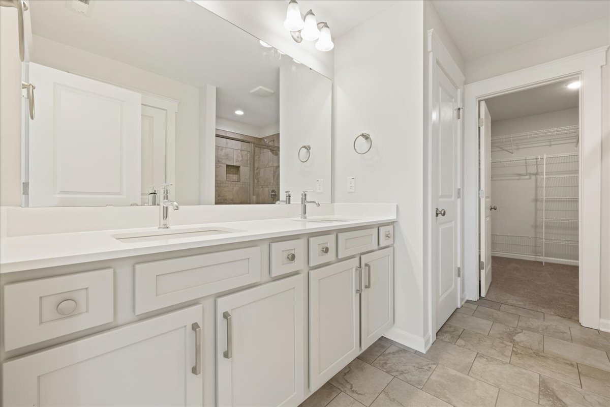 https://assets.windsorhomes.us/img/VR_lot106_Cameron_elvB_511_Valentine_Ct_primary_bath.jpg