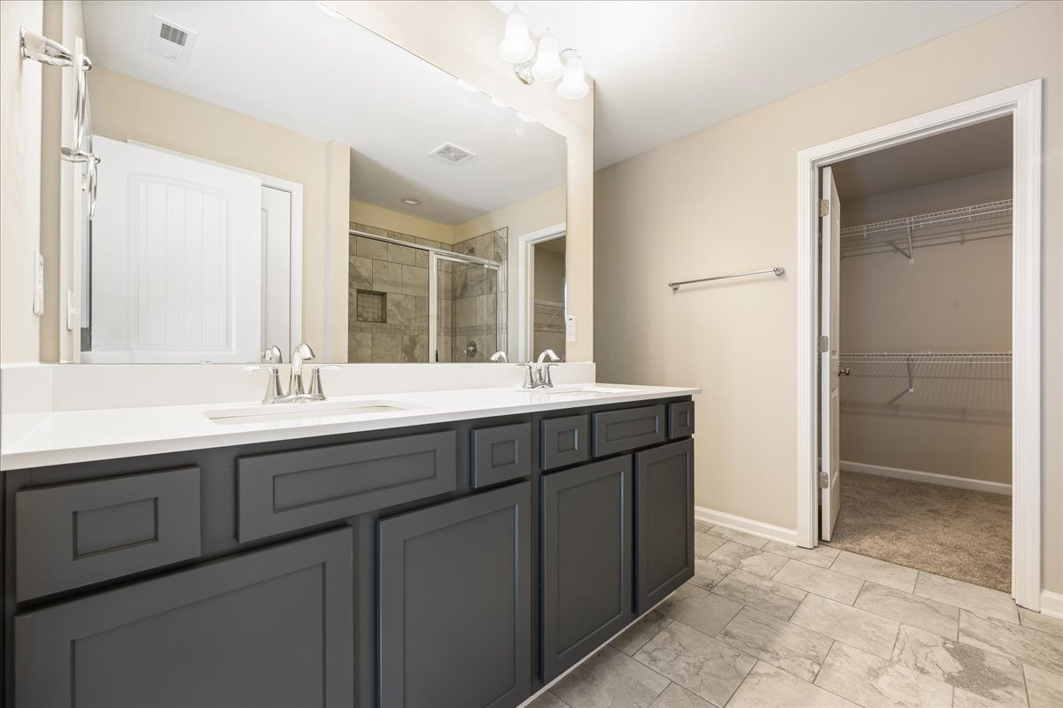 https://assets.windsorhomes.us/img/VR_lot11_Southport_elvA_1826_Parham_Drive_primary_bath.jpg