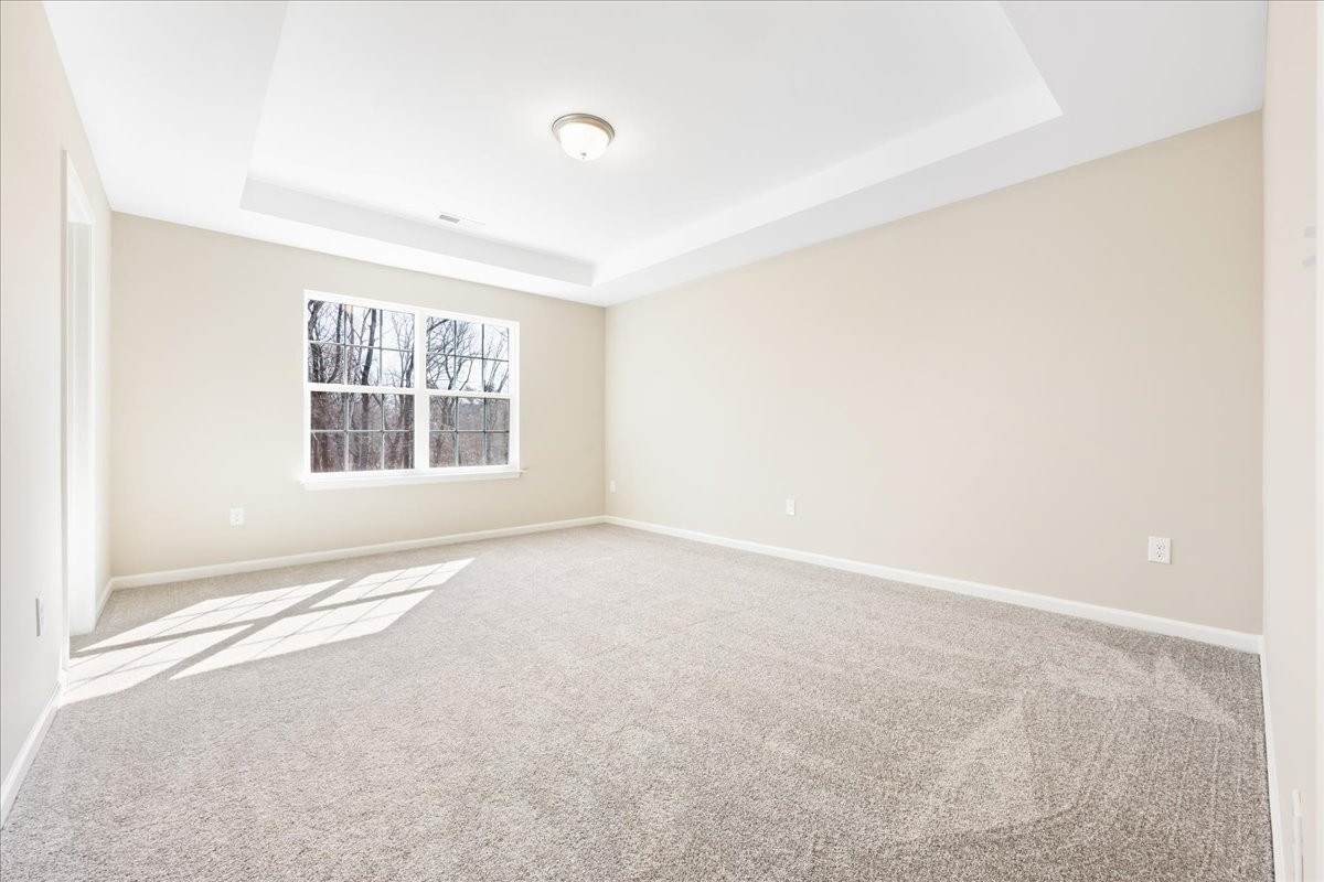 https://assets.windsorhomes.us/img/VR_lot11_Southport_elvA_1826_Parham_Drive_primary_suite.jpg