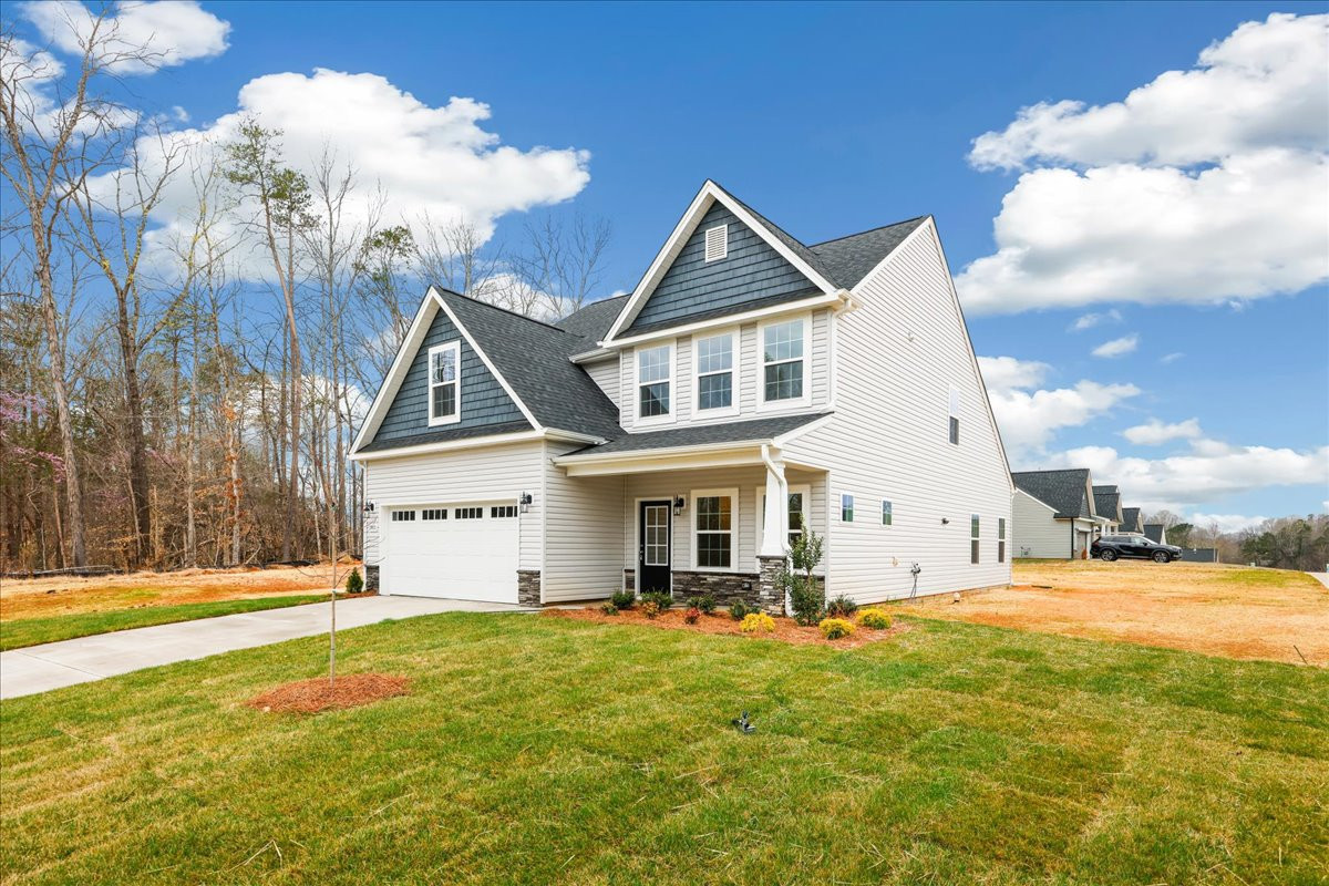 https://assets.windsorhomes.us/img/VR_lot72_Richmond_elvA_1901_Parham_Dr_exterior_side.jpg