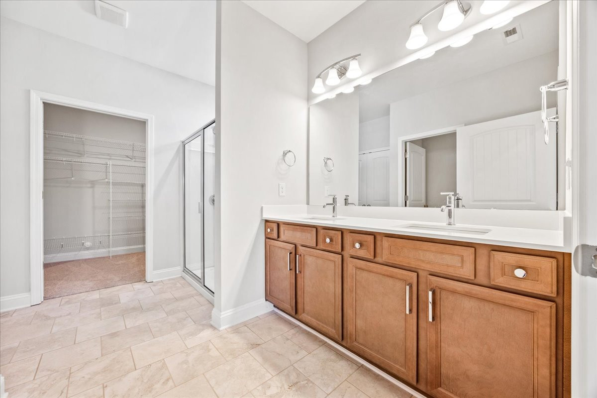 https://assets.windsorhomes.us/img/VR_lot89_Pinehurst_elvB_1811_Parham_Drive_primary_bath.jpg