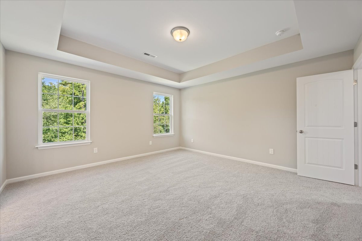 https://assets.windsorhomes.us/img/WP_lot33_Cameron_elvC_3199_Riley_Ford_Tr_primary_bedroom.jpg