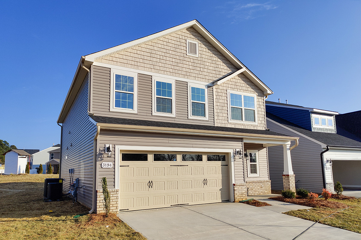 https://assets.windsorhomes.us/img/WP_lot44_Columbia_elvA_3194_Riley_Ford_Trail_exterior_side.jpg